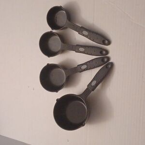 4/$40 Black Measuring Cups With Handles - Set of 4